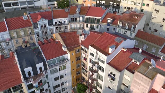 Curvy Street in Lisbon with Azulejo Fascades. Aerial Shot of Traditional Portuguese Houses decorated with Ceramic Tiles