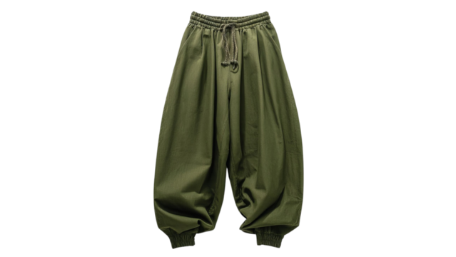 PNG of Stylish unisex olive green baggy pants with elastic cuffs and a drawstring waist for a comfortable fit.