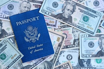 US passport with USA dollars money bills, American citizen in United States of America concept