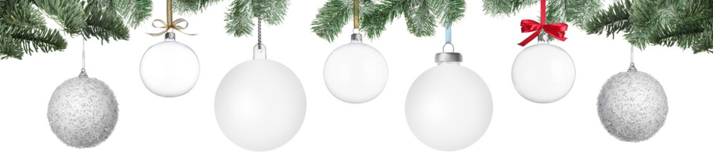 Christmas balls and fir tree branches on white background. Banner design