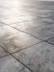 Fototapeta premium High angle view of a concrete tiled surface. Neutral background.