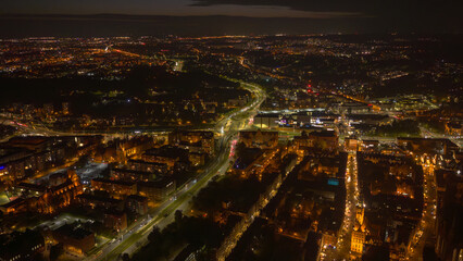 Aerial night view of Gdansk Old Town and St Marys Church by river
