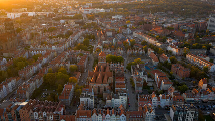 Aerial golden hour view of Gdansk Old Town and St Marys Church