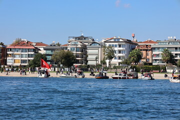 Boats gathered around the Florya Atat&uuml;rk Mansion are celebrating October 29 Republic Day with Turkish flags.