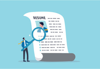 Candidate resume review by HR human resources hiring manager, employment or searching for talent and new staff concept, smart businessman hiring manager using magnifying glass tor review resume.