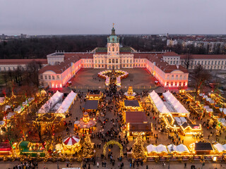 Christmas market in Berlin. Aerial Shot of Weihnachtsmark on Charlottenburg Palace. Winter Holidays...