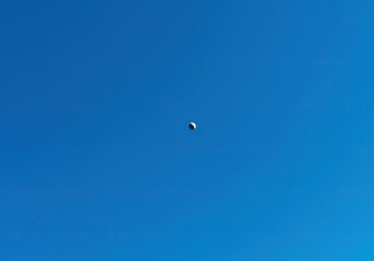 A perfect deep blue summer sky stretching endlessly above, offering a sense of peace, clarity, and limitless potential for new ideas ,cyan ,open ,nature