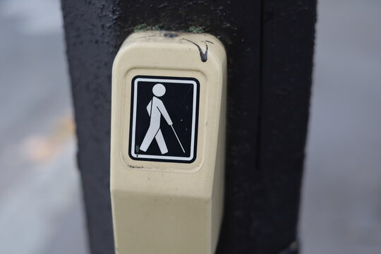 Blind persons road crossing button in France - Powered by Adobe