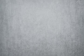 Fototapeta premium Worn cement wall texture in dark gray with subtle gradient and fine microcracks