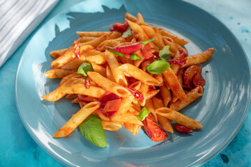 Spicy Italian penne all'Arrabbiata pasta with tomato chili sauce