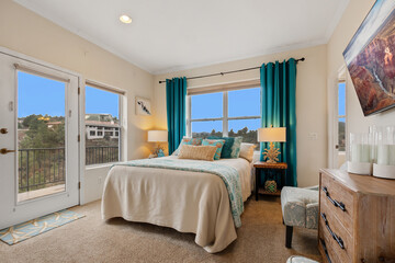 The bedroom has a large bed, dresser, chair, and TV for comfort