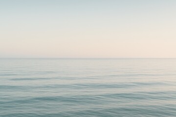 Fototapeta premium Vast sea horizon under pastel sky tranquil minimal seascape with gentle wave ripples