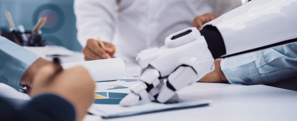 Business professionals working alongside AI-powered tools to refine corporate strategies, improve efficiency, and optimize decision-making. Noogenesis AI