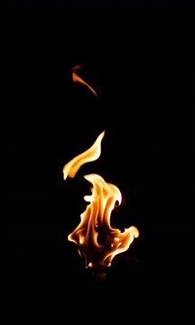 4K Torch flame in slow motion isolated on black background, realistic fire effect for overlay or screen mode, burning torch light flicker, cinematic energy glow, heat texture, motion design element