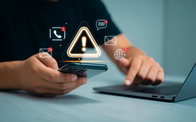 Person using smartphone and laptop with digital warning icons and notifications for alerts and messages