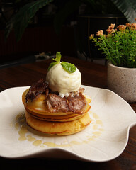 Gourmet Pancake with Grilled Beef and Vanilla Ice Cream Topped with Honey Syrup