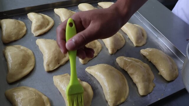 Close Up of Baker Hands Kneading Dough for Homemade Artisan Bread