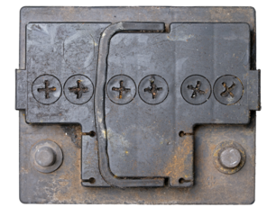 Old battery for a combustion passenger car on an isolated background.