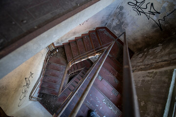 Abandoned distillery tower in Italy – circular industrial building with glass dome, steel beams, panoramic windows, decaying factory interior, urban exploration, post-industrial architecture