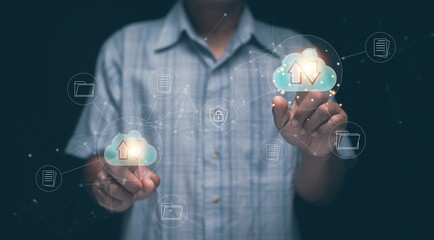 Cloud computing and data storage concept. Businessman touching holographic cloud icons with upload and download symbols. Digital data management, network connection and online security system.