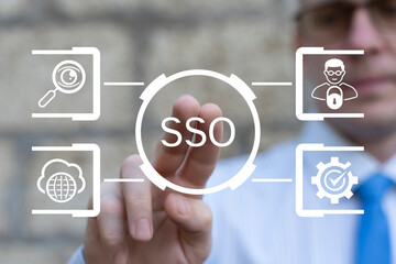 Business person using virtual touch screen presses the text SSO. SSO Single Sign On concept. SSO...