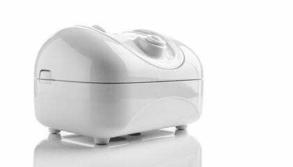 Modern white small appliance with control knobs on a reflective surface