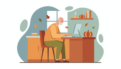 Senior man uses a desktop computer at home during the cozy autumn season