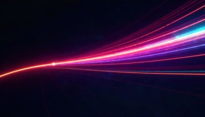 Abstract light trails creating a sense of speed, technology, and futuristic movement. Abstract image featuring vibrant, multi colored light trails streaking across a dark, almost black background,