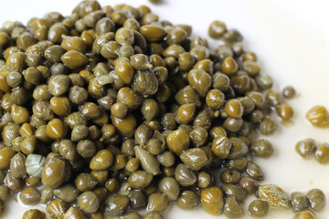 Capers in brine, small pickled flower buds