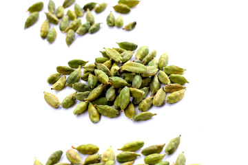 Green cardamom pods with aromatic and medicinal benefits.