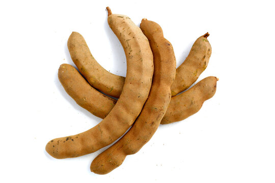 Fresh tamarind on a white background.