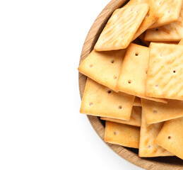 Wooden bowl with tasty crackers on white background, closeup