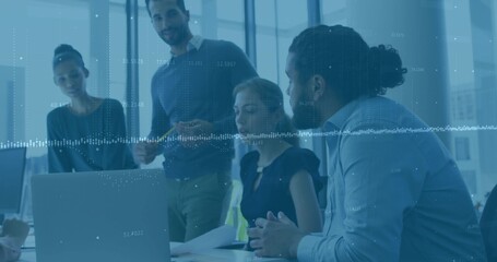 Presenting data, project team collaborating in conference room with laptop and overlay graphics