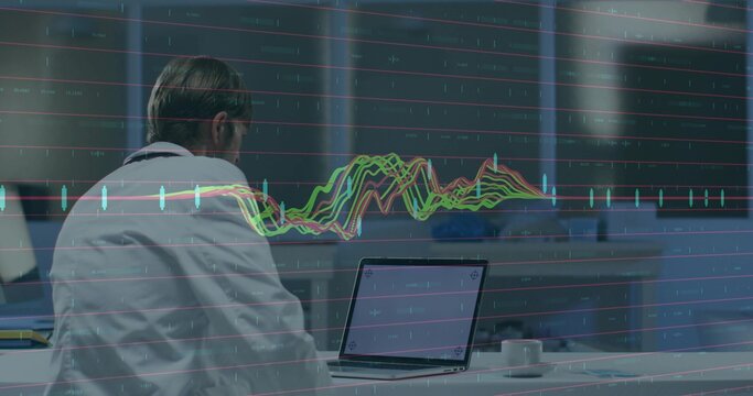 Analyst wearing business attire analyzing data on laptop in office with display screens, copy space - Powered by Adobe