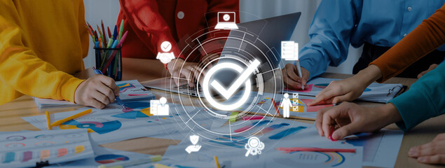 A vibrant workspace scene showcasing diverse professionals engaging in creative planning and design, surrounded by colorful charts and documents, symbolizing teamwork and innovation. Trope