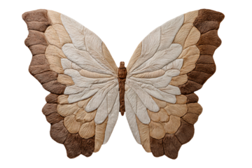 a butterfly made of leaves on a white background