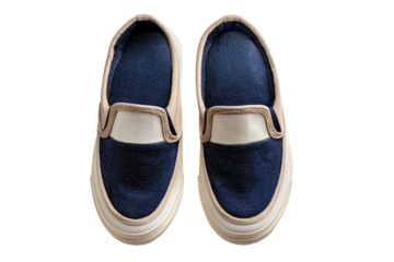 a pair of blue and white shoes on a white surface