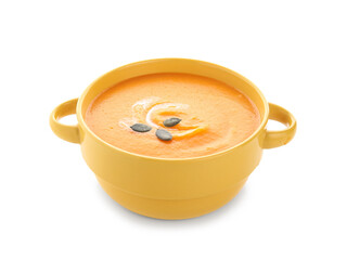 Pot of delicious pumpkin cream soup with seeds on white background
