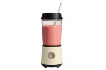 Portable blender making healthy fruit smoothie, preparing fresh pink drink in personal kitchen appliance