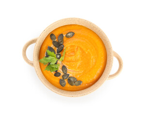 Pot of tasty pumpkin cream soup isolated on white background, closeup