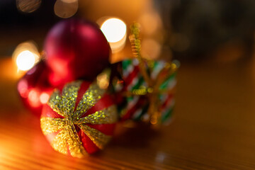 Christmas decorations shining with warm light and bokeh blur