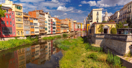 Colorful riverside houses and cathedral in Girona Spain