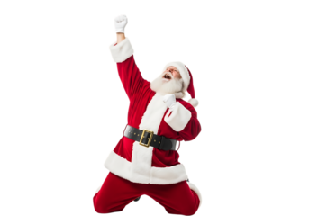 Excited santa claus on his knees with his fist raised in the air, celebrating a victory or a successful christmas, isolated on transparent background