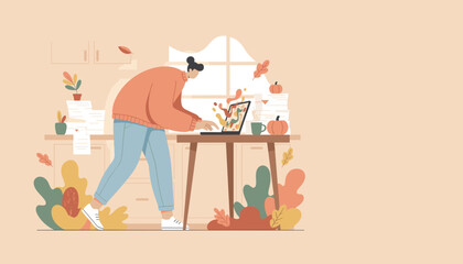 Creative work from home during autumn Person standing at desk using laptop focused on digital tasks