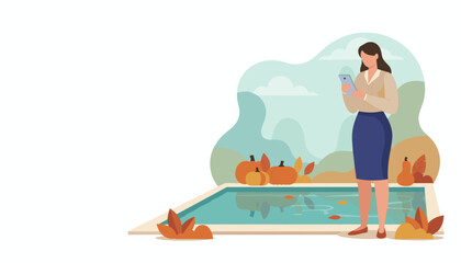 Woman using phone near a pool decorated with autumn pumpkins and foliage Fall tech lifestyle concept
