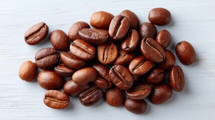Styled Flat Lay of Roasted Coffee Beans Scattered on a Light Blue Wooden Surface Rich Brown Aromatic Coffee Grains for Beverages and Food Photography with Soft Natural Lighting