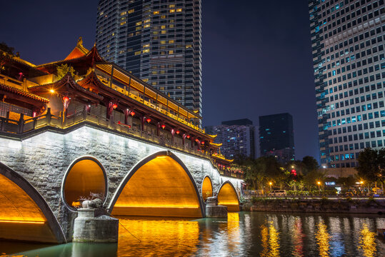 Charming night view of Anshun bridge and modern skyline in Chengdu
