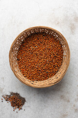 Overhead view of dusty and dirty red guinea corn, top view of Red guinea corn also known as sorghum