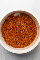 Overhead view of washed red guinea corn, top view of Red guinea corn also known as sorghum