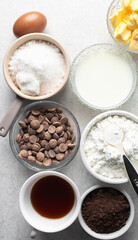 mise en place for making chocolate muffins, Flatlay of ingredients for making chocolate muffins, ingredients for making chocolate muffins